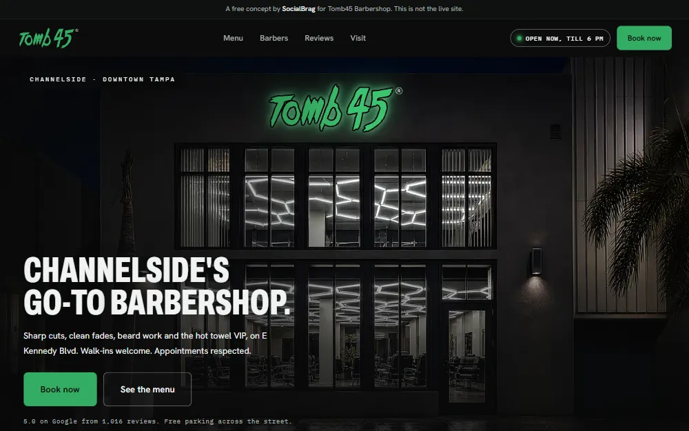 Tomb45 concept: the barbershop's storefront at night, its green sign lit over hexagon ceiling lights, beside the headline Channelside's go-to barbershop.